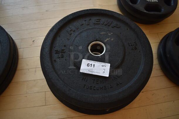 2 Hi Temp Metal 25 Pound Weight Plate. BUYER MUST REMOVE. 2 Times Your Bid! (aerobic room)

