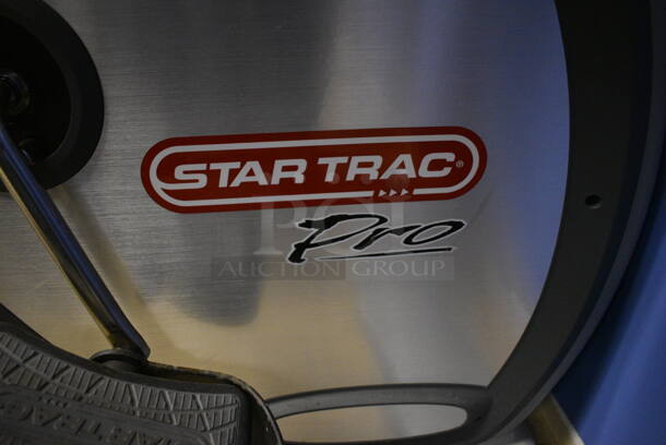 NICE! Star Trac Pro Metal Commercial Floor Style Seated Stationary Bicycle. BUYER MUST REMOVE. 26x70x52. Tested and Does Not Power On. (spin cycle room closet) - Image 8 of 8