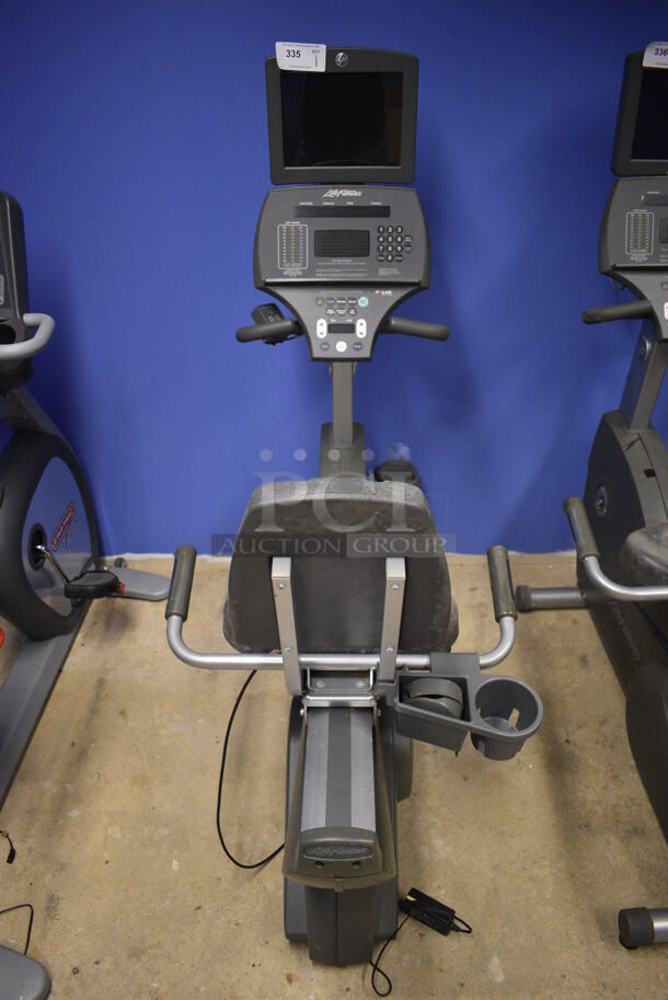 NICE! Life Fitness Metal Commercial Floor Style Seated Stationary Bicycle w/ Life Fitness Monitor. BUYER MUST REMOVE. 27x56x71. Tested and Does Not Power On. (spin cycle room closet) - Image 2 of 7