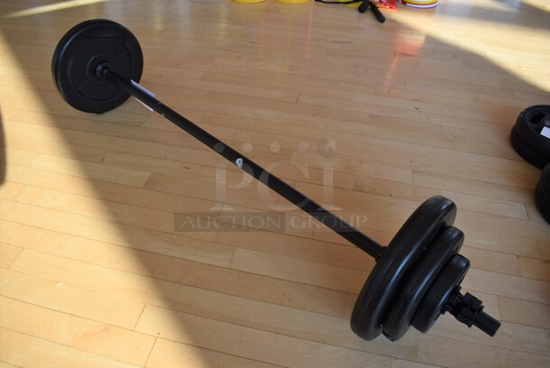 6 Les Mills Body Pump Weight Plates w/ Body Pump Bar; Two 2.2 Pound, Two 5.5 Pound, Two 11 Pound. This Lot Is One Complete Set of 6 Weights and 1 Bar. Does Not Come Put Together. Stock Picture - Cosmetic Condition May Vary. 52" BUYER MUST REMOVE. 6 Times Your Bid! (aerobic room) - Image 6 of 9