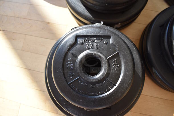 6 Les Mills Body Pump Weight Plates w/ Body Pump Bar; Two 2.2 Pound, Two 5.5 Pound, Two 11 Pound. This Lot Is One Complete Set of 6 Weights and 1 Bar. Does Not Come Put Together. Stock Picture - Cosmetic Condition May Vary. 52" BUYER MUST REMOVE. 6 Times Your Bid! (aerobic room) - Image 7 of 9