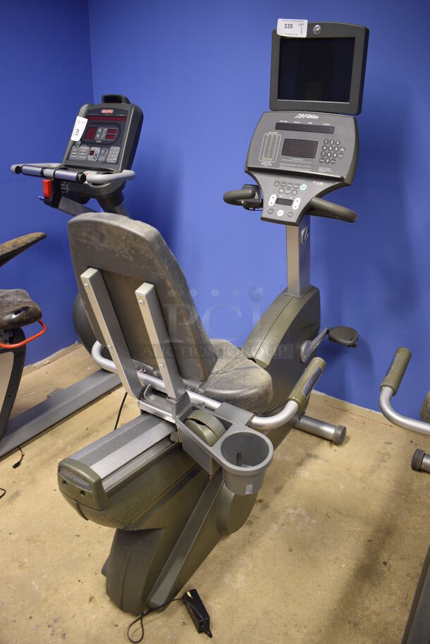 NICE! Life Fitness Metal Commercial Floor Style Seated Stationary Bicycle w/ Life Fitness Monitor. BUYER MUST REMOVE. 27x56x71. Tested and Does Not Power On. (spin cycle room closet) - Image 7 of 7