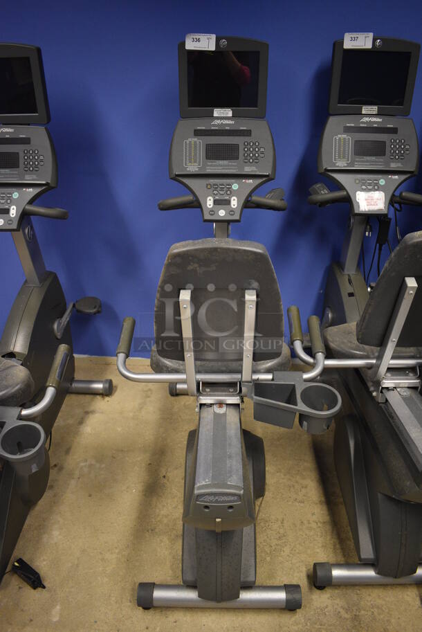 NICE! Life Fitness Metal Commercial Floor Style Seated Stationary Bicycle w/ Life Fitness Monitor. BUYER MUST REMOVE. 27x56x71. Tested and Does Not Power On. (spin cycle room closet) - Image 3 of 9
