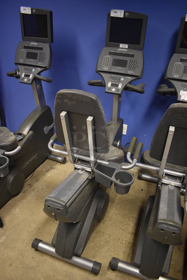NICE! Life Fitness Metal Commercial Floor Style Seated Stationary Bicycle w/ Life Fitness Monitor. BUYER MUST REMOVE. 27x56x71. Tested and Does Not Power On. (spin cycle room closet) - Image 2 of 9