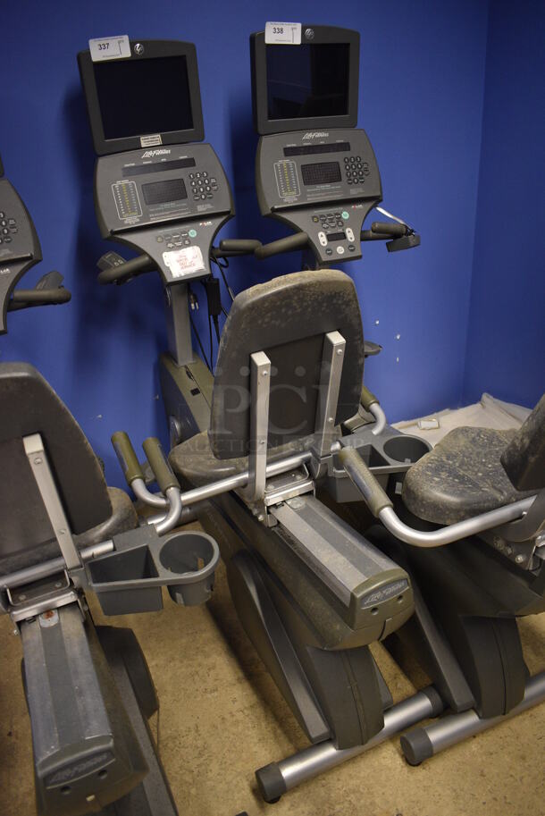 NICE! Life Fitness Metal Commercial Floor Style Seated Stationary Bicycle w/ Life Fitness Monitor. BUYER MUST REMOVE. 27x56x71. Tested and Does Not Power On. (spin cycle room closet) - Image 2 of 6