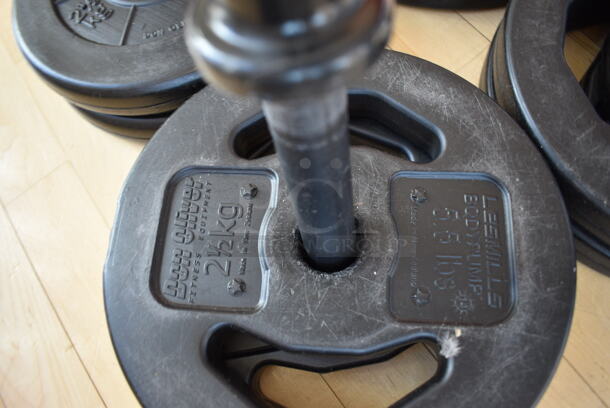 7 Various Les Mills Weight Plates w/ 2 Metal Body Bars; Six 5.5 Pounds and One 11 Pounds. 52" BUYER MUST REMOVE. (aerobic room) - Image 4 of 6