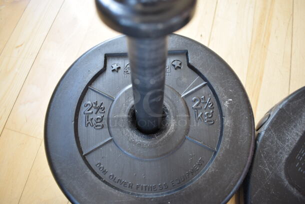 7 Various Les Mills Weight Plates w/ 2 Metal Body Bars; Six 5.5 Pounds and One 11 Pounds. 52" BUYER MUST REMOVE. (aerobic room) - Image 5 of 6
