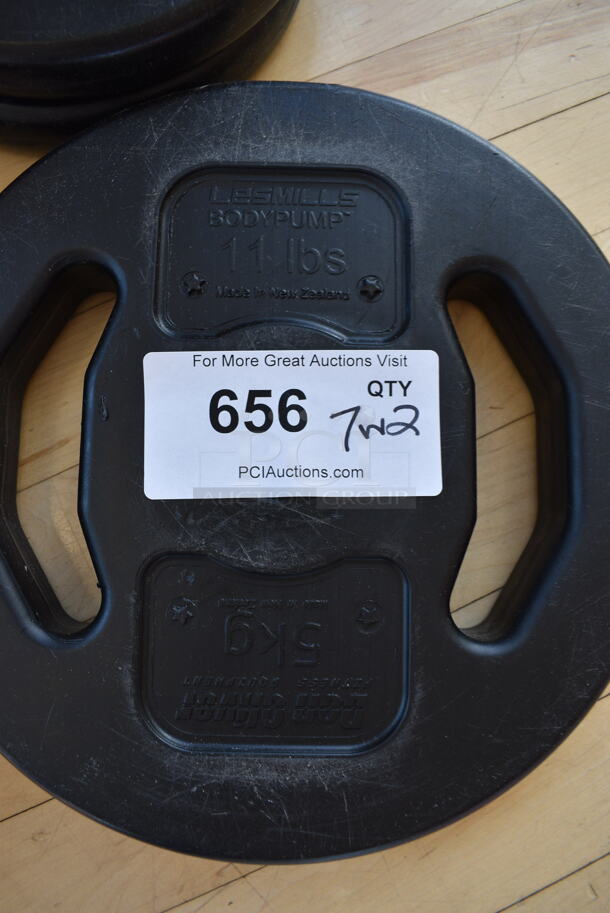 7 Various Les Mills Weight Plates w/ 2 Metal Body Bars; Six 5.5 Pounds and One 11 Pounds. 52" BUYER MUST REMOVE. (aerobic room) - Image 6 of 6