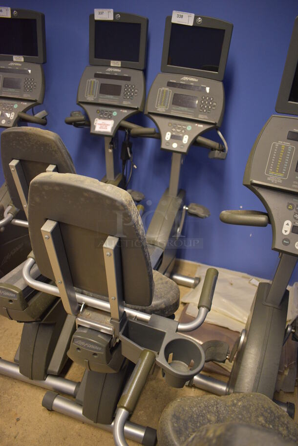 NICE! Life Fitness Metal Commercial Floor Style Seated Stationary Bicycle w/ Life Fitness Monitor. BUYER MUST REMOVE. 27x56x71. Tested and Does Not Power On. (spin cycle room closet) - Image 3 of 8