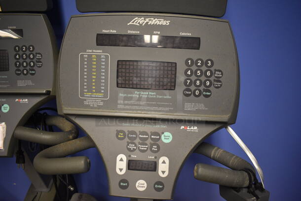 NICE! Life Fitness Metal Commercial Floor Style Seated Stationary Bicycle w/ Life Fitness Monitor. BUYER MUST REMOVE. 27x56x71. Tested and Does Not Power On. (spin cycle room closet) - Image 6 of 8