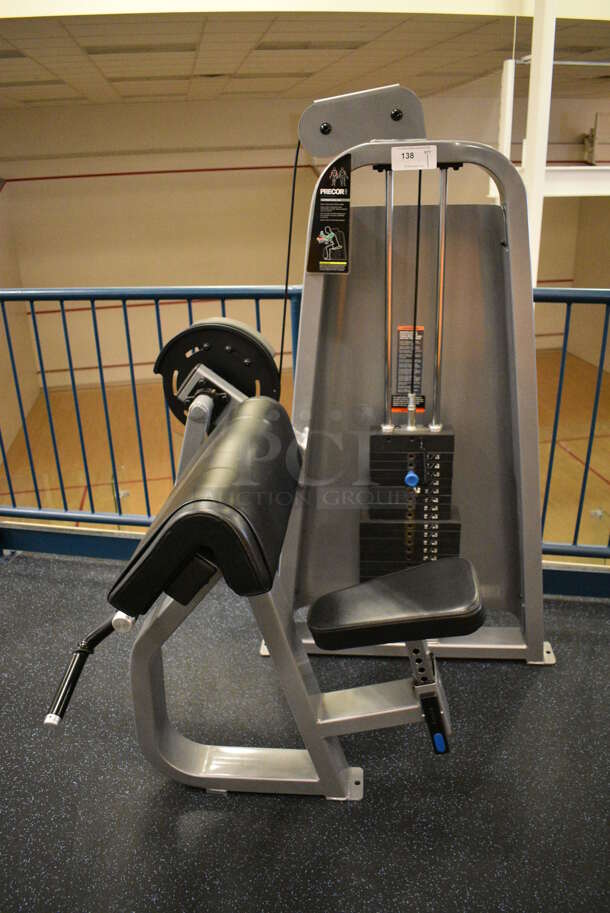 NICE! Precor Metal Commercial Floor Style Camber Curl Machine. BUYER MUST REMOVE. 46x39x63. (upstairs) This Unit Will Be Moved Down To The First Floor Before Pick Up Day Begins!