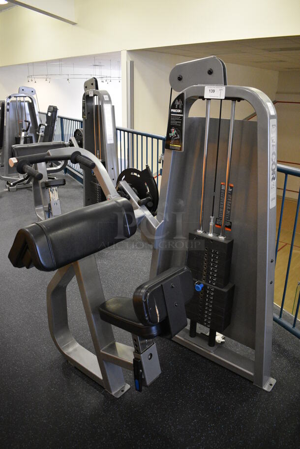 NICE! Precor Metal Commercial Floor Style Tricep Extension Machine. BUYER MUST REMOVE. 46x39x63. (upstairs) This Unit Will Be Moved Down To The First Floor Before Pick Up Day Begins! - Image 1 of 6