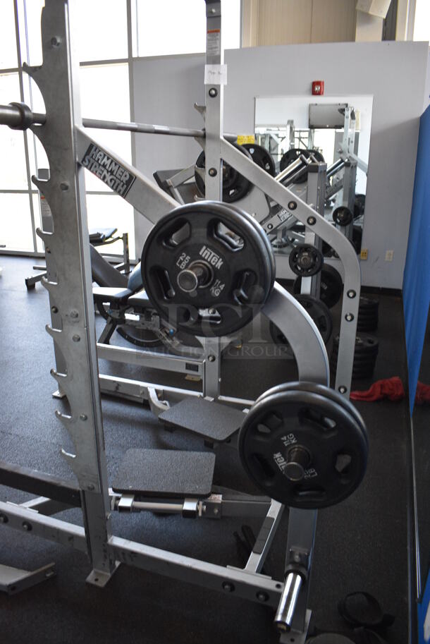 NICE! Hammer Strength Gray Metal Floor Style Squat Rack w/ Olympic Bar. Does Not Include Weight Plates. BUYER MUST REMOVE - Unit May Need Disassembly For Removal. 65x73x91. (weight room) - Image 5 of 9