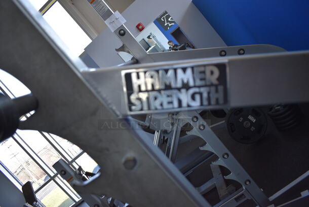 NICE! Hammer Strength Gray Metal Floor Style Squat Rack w/ Olympic Bar. Does Not Include Weight Plates. BUYER MUST REMOVE - Unit May Need Disassembly For Removal. 65x73x91. (weight room) - Image 7 of 9
