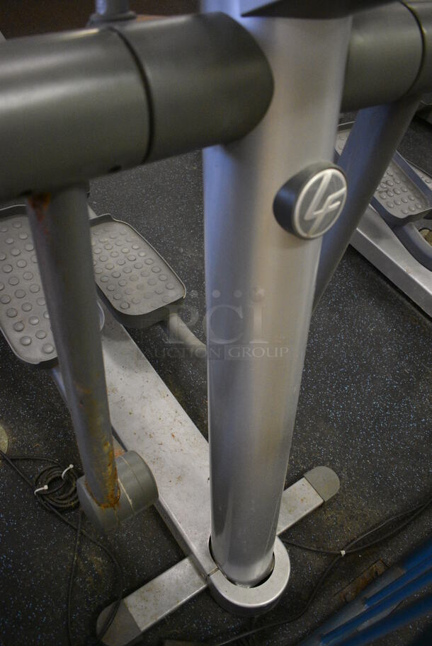 NICE! Precor Model 95xi Experience Metal Floor Style Elliptical Cross Trainer Machine w/ Life Fitness Model LCD-0201 Monitor. BUYER MUST REMOVE. 33x85x75. Tested and Working! (upstairs) This Unit Will Be Moved Down To The First Floor Before Pick Up Day Begins! - Image 9 of 9