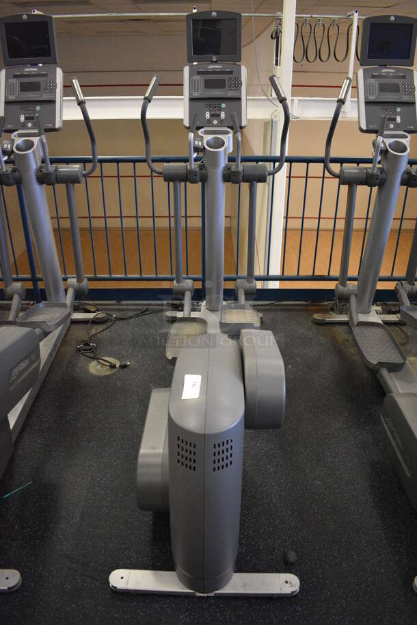 NICE! Precor Model 95xi Experience Metal Floor Style Elliptical Cross Trainer Machine w/ Life Fitness Model LCD-0201 Monitor. BUYER MUST REMOVE. 33x85x75. Tested and Working! (upstairs) This Unit Will Be Moved Down To The First Floor Before Pick Up Day Begins!