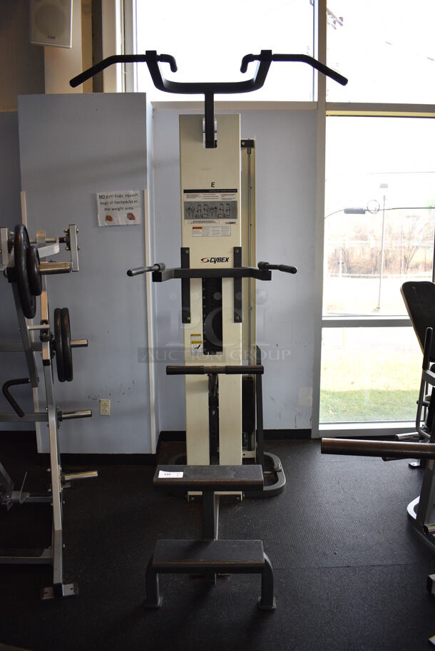 NICE! Cybex Metal Floor Style Assisted Pull Up Machine. BUYER MUST REMOVE. 32x76x97. (weight room)
