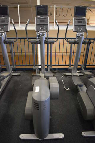 NICE! Precor Model 95xi Experience Metal Floor Style Elliptical Cross Trainer Machine w/ Life Fitness Model LCD-0201 Monitor. BUYER MUST REMOVE. 33x85x75. Tested and Working! (upstairs) This Unit Will Be Moved Down To The First Floor Before Pick Up Day Begins!
