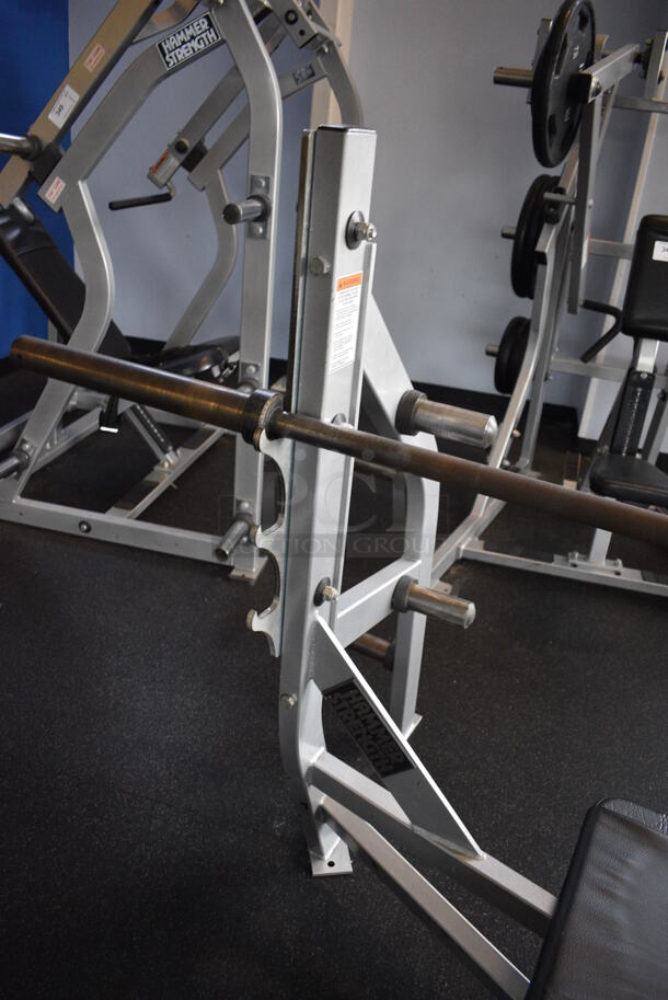 NICE! Hammer Strength Gray Metal Floor Style Flat Back Bench Press w/ Olympic Bar. BUYER MUST REMOVE - Unit May Need Disassembly For Removal. 67x63x51. (weight room) - Image 6 of 7