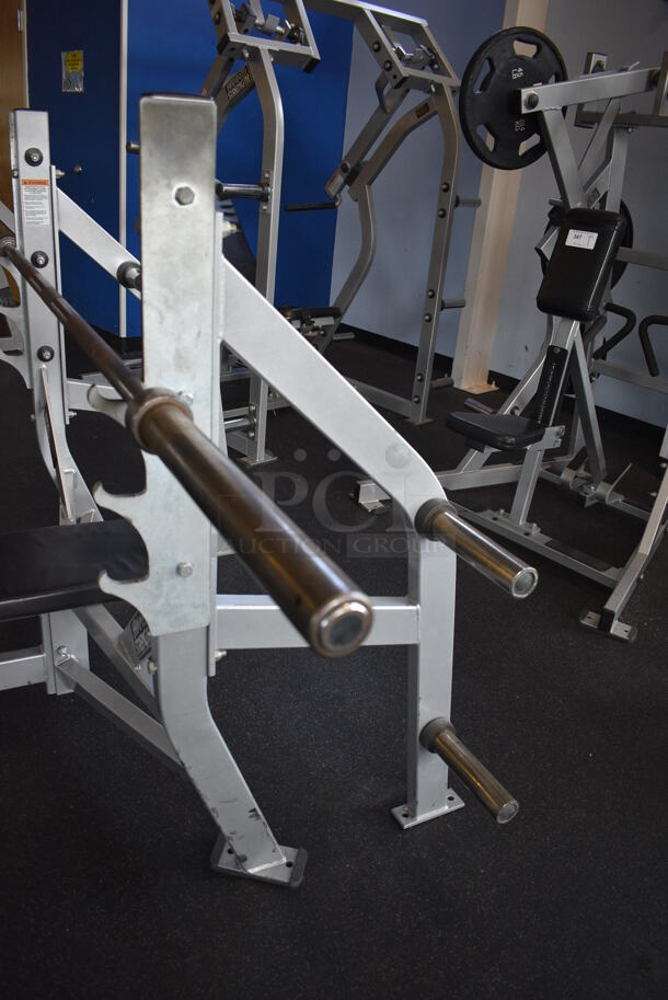NICE! Hammer Strength Gray Metal Floor Style Flat Back Bench Press w/ Olympic Bar. BUYER MUST REMOVE - Unit May Need Disassembly For Removal. 67x63x51. (weight room) - Image 7 of 7