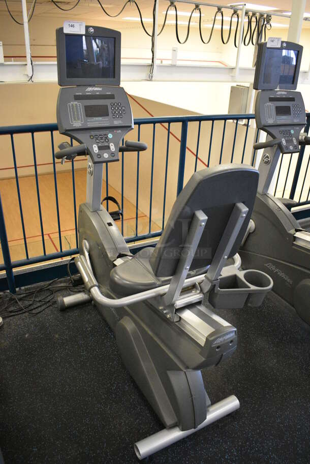 NICE! Precor Model 95Ri Experience Metal Floor Style Seated Stationary Bicycle Machine w/ Life Fitness Monitor. BUYER MUST REMOVE. 28x59x62. Tested and Working! (upstairs) This Unit Will Be Moved Down To The First Floor Before Pick Up Day Begins!