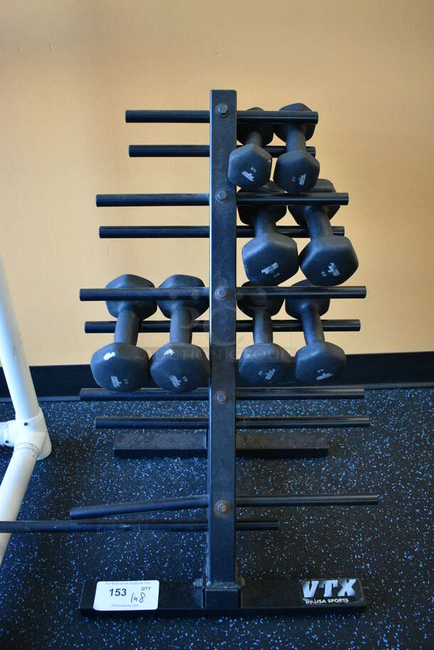 VTX Black Metal Floor Style Dumbbell Rack w/ Two 3 Pound, Two 4 Pound, Two 5 Pound and Two 6 Pound. BUYER MUST REMOVE. 20x17x29. (upstairs)