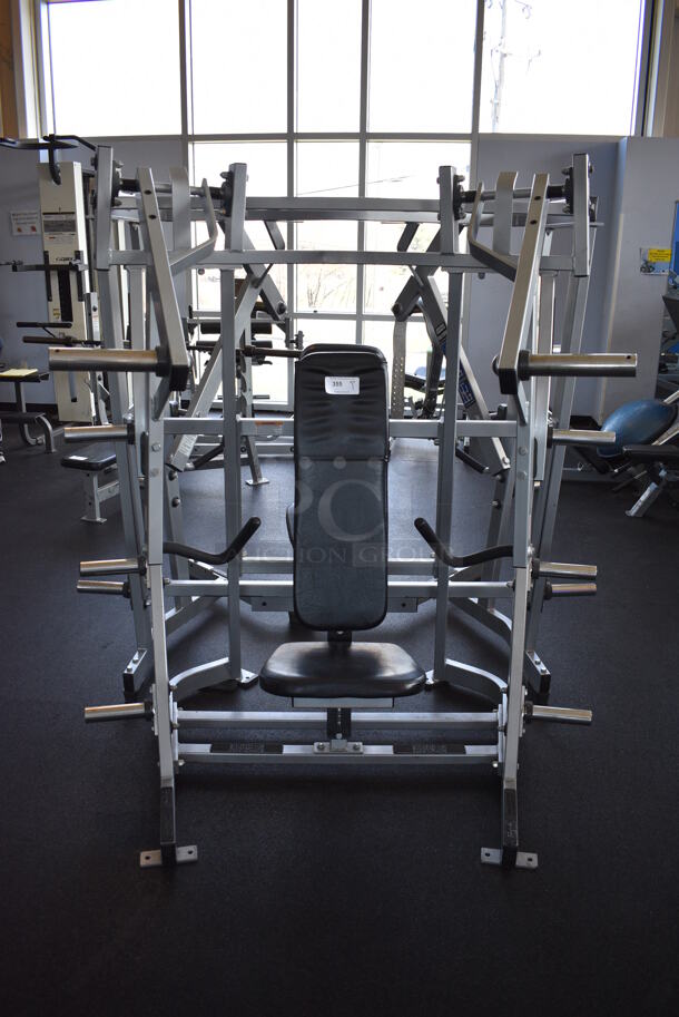 NICE! Hammer Strength Gray Metal Floor Style Iso-lateral Bench Press Machine. BUYER MUST REMOVE - Unit May Need Disassembly For Removal. 66x44x72. (weight room)