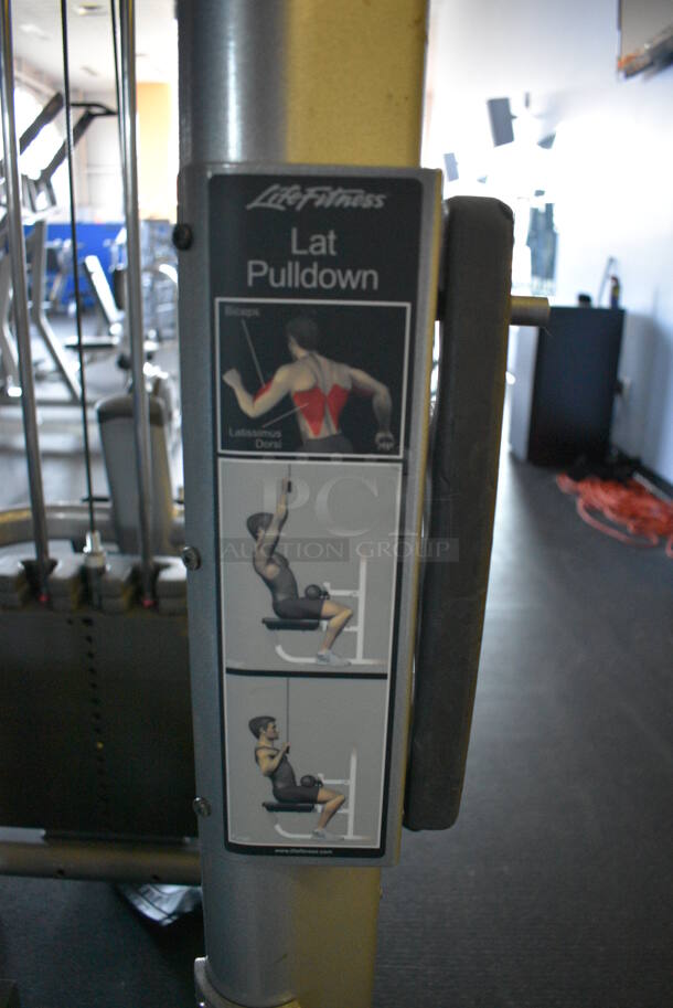 NICE! Hammer Strength Gray Metal Floor Style Multi Station Machine; Adjustable Pulley, Low Row, Adjustable Cable Crossover, Lat Pulldown and Triceps Pushdown. BUYER MUST REMOVE - Unit May Need Disassembly For Removal. 215x140x95. (weight room) - Image 7 of 12
