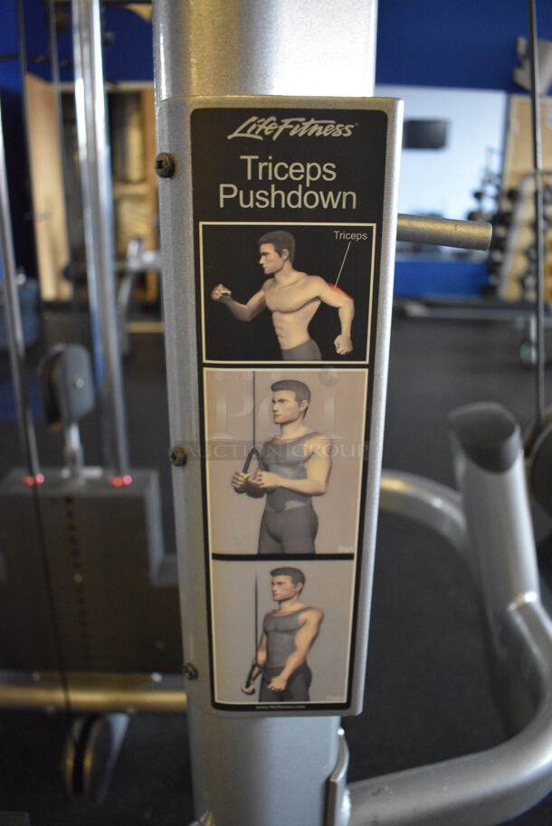 NICE! Hammer Strength Gray Metal Floor Style Multi Station Machine; Adjustable Pulley, Low Row, Adjustable Cable Crossover, Lat Pulldown and Triceps Pushdown. BUYER MUST REMOVE - Unit May Need Disassembly For Removal. 215x140x95. (weight room) - Image 8 of 12