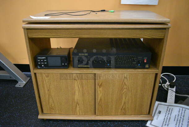 ALL ONE MONEY! Lot of Wood Pattern TV Stand w/ SirisXM Unit and Bogen Gold Seal Series Aural Exciter. 28x16x24. (upstairs) - Image 1 of 7