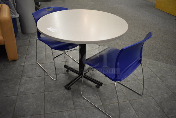 Gray Round Table on Metal Table Base and 2 Blue Chairs. 36x36x30, 20x21x31. (lobby) - Image 2 of 3