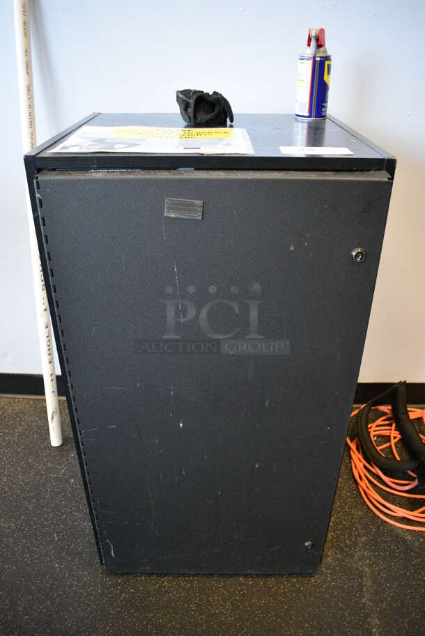 Black Metal AV Cabinet. Door is Locked. BUYER MUST REMOVE. 20.5x19x36.5. (weight room)