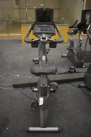 GREAT! Life Fitness Model 95ci Metal Floor Style Upright Stationary Bicycle w/ Life Fitness Monitor. BUYER MUST REMOVE. 24x50x63. Tested and Working! (lobby)
