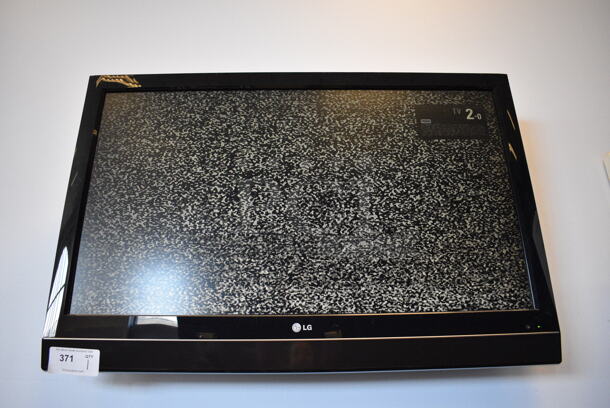 LG 42" Television. BUYER MUST REMOVE. Tested and Working! (weight room) Unit Is Approximately 8 Feet Off Of The Ground - Image 1 of 4
