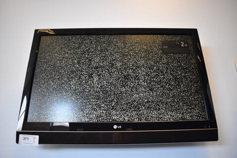 LG 42" Television. BUYER MUST REMOVE. Tested and Working! (weight room) Unit Is Approximately 8 Feet Off Of The Ground