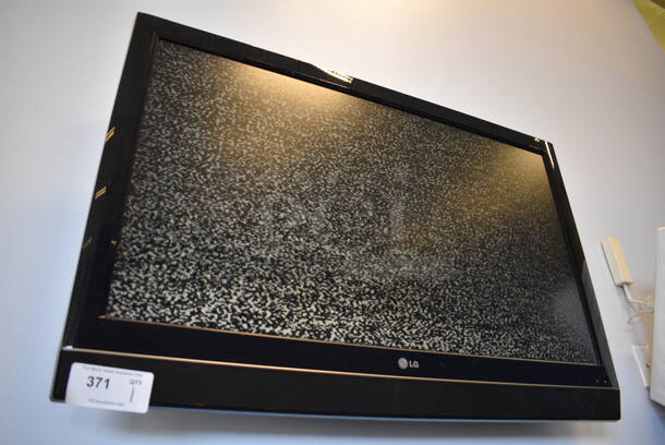LG 42" Television. BUYER MUST REMOVE. Tested and Working! (weight room) Unit Is Approximately 8 Feet Off Of The Ground - Image 2 of 4
