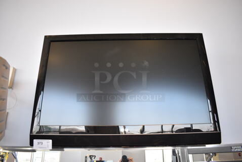 LG 42" Television. BUYER MUST REMOVE. Tested and Working! (weight room) Unit Is Approximately 8 Feet Off Of The Ground