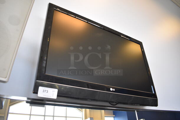 LG 42" Television. BUYER MUST REMOVE. Tested and Working! (weight room) Unit Is Approximately 8 Feet Off Of The Ground - Image 2 of 3