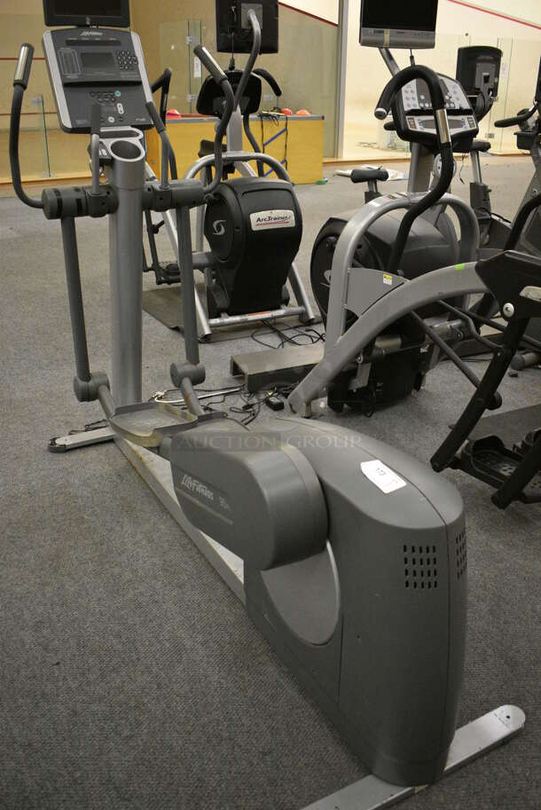 NICE! Life Fitness Model 95xi Experience Metal Floor Style Elliptical Cross Trainer Machine. BUYER MUST REMOVE. 32x86x74. Tested and Working! (lobby)
 - Image 9 of 11