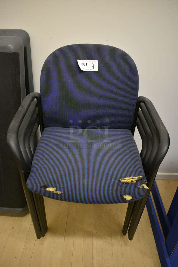 4 Blue Chairs w/ Arm Rests. 24x18x34. 4 Times Your Bid! (behind squash court - left)