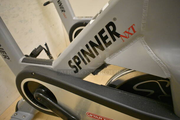 NICE! Star Trac Spinner NXT Metal Commercial Floor Style Upright Stationary Bicycle. BUYER MUST REMOVE. 21x47x45. Working Condition Is Not Known. (behind squash court - left) - Image 4 of 4