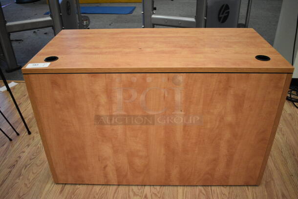 Wood Pattern Desk. 47x23.5x29.5. (lobby)
