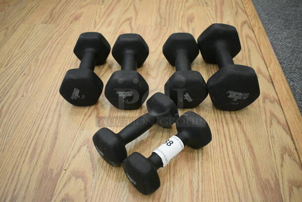 6 Black Neoprene Dumbbells; Two 4 Pounds, Two 8 Pounds and Two 12 Pounds. Includes 4x8x4. 6 Times Your Bid! (lobby)

