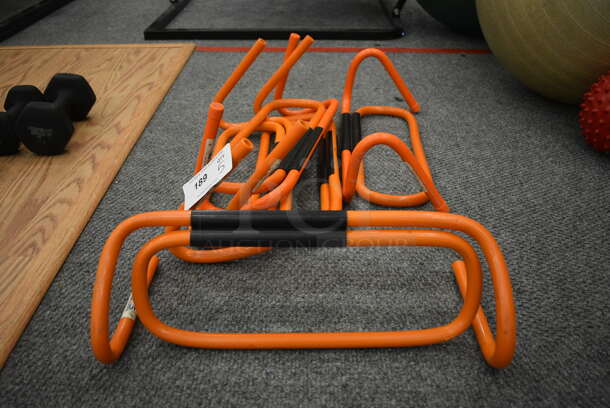 5 Orange Poly Hurdles. 18x8.5x6. 5 Times Your Bid! (lobby)