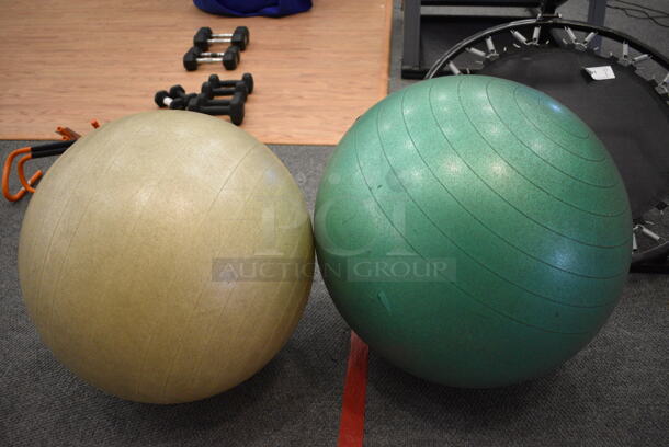 2 Various Stability Balls. Includes 22x22x22. 2 Times Your Bid! (lobby)
