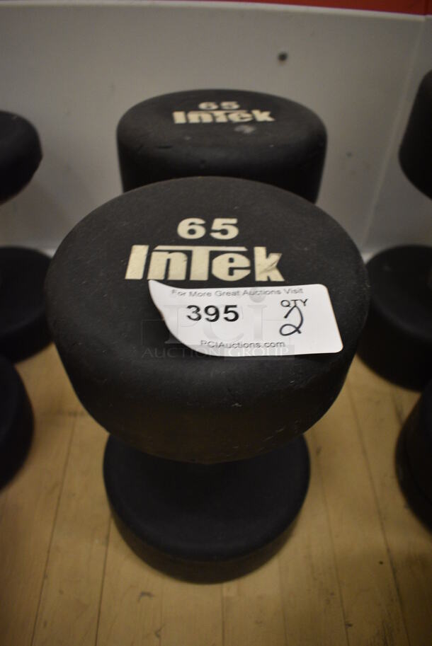 2 Intek Black and Chrome Metal 65 Pound Dumbbells. BUYER MUST REMOVE. 8x12.5x8. 2 Times Your Bid! (behind squash court - left)