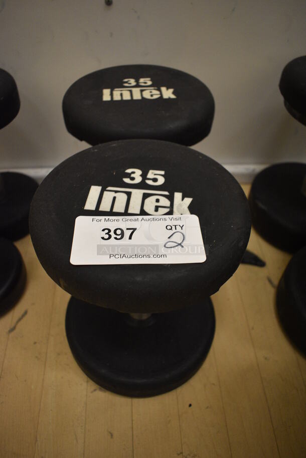 2 Intek Black and Chrome Metal 35 Pound Dumbbells. BUYER MUST REMOVE. 8x10x8. 2 Times Your Bid! (behind squash court - left)