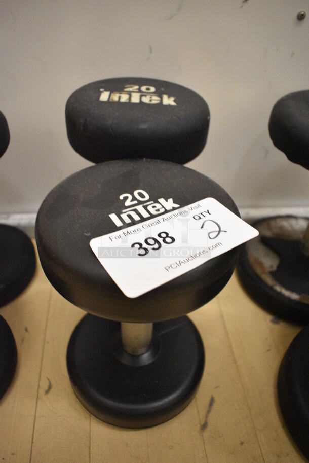 2 Intek Black and Chrome Metal 20 Pound Dumbbells. BUYER MUST REMOVE. 6x9x6. 2 Times Your Bid! (behind squash court - left)