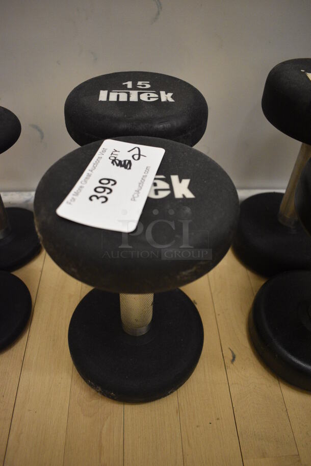 2 Intek Black and Chrome Metal 15 Pound Dumbbells. BUYER MUST REMOVE. 6x9x6. 2 Times Your Bid! (behind squash court - left)