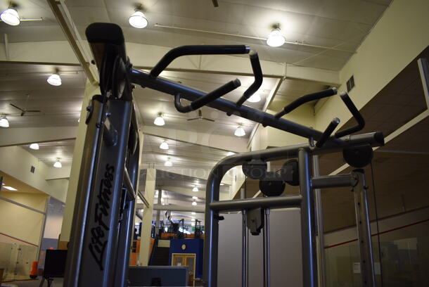 Life Fitness Model CMDAP Gray Metal Floor Style Dual Adjustable Pulley Functional Trainer Machine. BUYER MUST REMOVE BUYER MUST REMOVE - Unit May Need Disassembly For Removal. 64x48x93. (lobby) - Image 9 of 12
